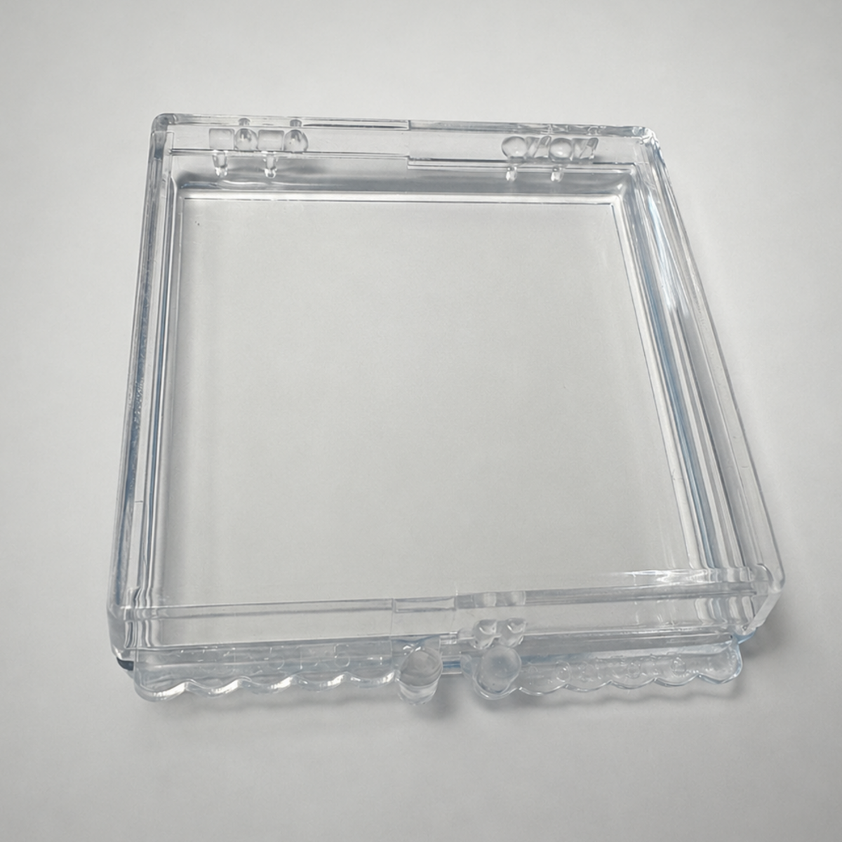 Closed self-adhesive chip carrier box with a clean unprinted tray