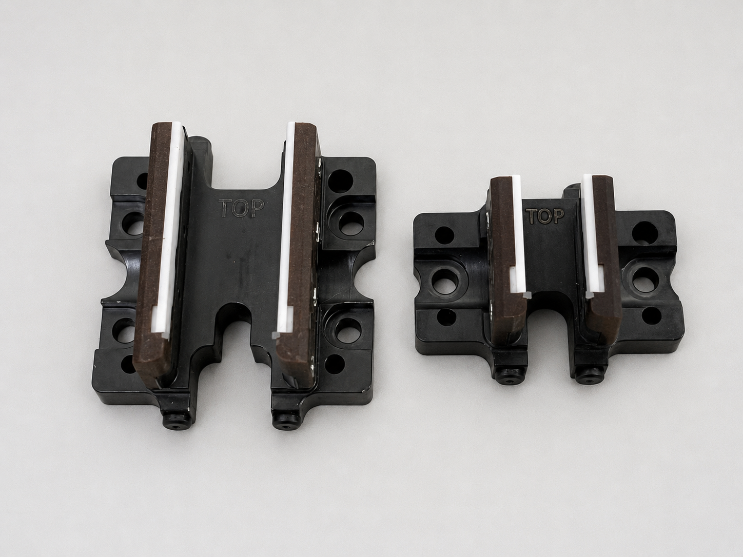 Custom test handler guide rail pair with TOP orientation marks